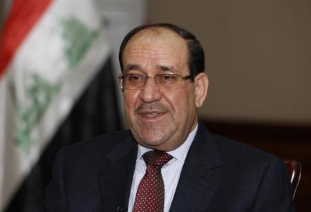 Iraq's Prime Minister al-Maliki speaks during an interview with Reuters in Baghdad