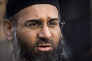 Muslim preacher Anjem Choudary addressing members of the media during a protest supporting Shari'ah Law in north London