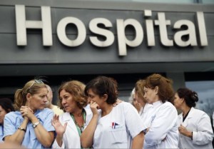 Health workers attend a protest outside La Paz Hospital calling for Spain's Health Minister Ana Mato to resign after a Spanish nurse contracted Ebola, in Madrid