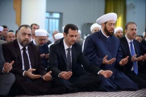 Syria's President Bashar al-Assad attends Eid al-Adha prayers at al-Nu'man bin Bashir mosque in Damascus