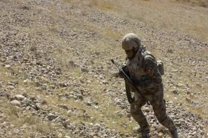 A member of the Iraqi security forces take part in an intensive security deployment against Islamic State militants in Adhaim, a village in Diyala province north of Baghdad