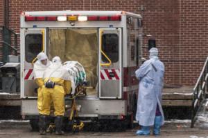 Dr. Martin Salia is placed on a stretcher upon his arrival at the Nebraska Medical Center Biocontainment Unit in Omaha, Nebraska