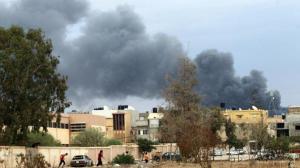 Smoke billows from buildings reported to be used for storing ammunition belonging to Benghazi-based .