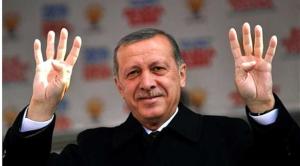 الرئيس التركي رجب طيب أردوغان يرفع شعار رابعة