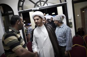 Ali Salman (centre) arrives at Al-Wefaq's headquarters in Zinj, west of Manama