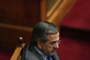 Greece"s Prime Minister Antonis Samaras looks on during the second of three rounds of a presidential vote at the Greek parliament in Athens