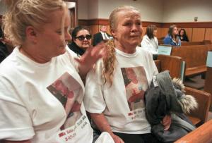 Julie Ramirez, left, consoles her mother, Betty Ramirez during a court inquest into the police shooting of Richard Ramirez in Billings, Mont.