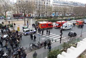 Police hunt three Frenchmen after 12 killed in Paris attack