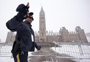 Royal Canadian Mounted Police (RCMP) officer on patrol outside the Parliament building in Ottawa