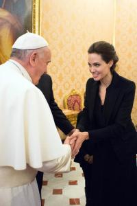 Pope Francis meets Angelina Jolie during a private audience at the Vatican