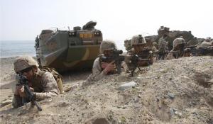 U.S. Marines take a position during the U.S.-South Korea joint landing exercises, called Ssangyong, as part of the Foal Eagle military exercises in Pohang, South Korea.