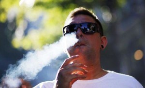 A man smokes marijuana during a demonstration in support of the legalization of marijuana in Buenos Aires