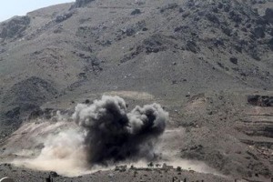 Smoke billows from a Noqum mountain after it was hit by an air strike in Yemen's capital Sanaa