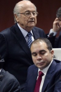 FIFA president Joseph S. Blatter, left, walks past Prince Ali bin al-Hussein, right, during the 65th FIFA Congress held at the Hallenstadion in Zurich, Switzerland