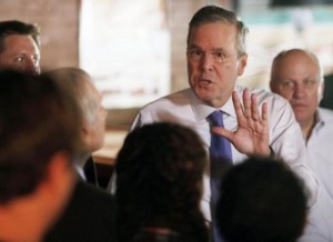 Jeb Bush answers questions as he speaks to a morning crowd at the Draft restaurant