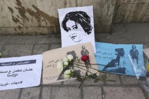 Flowers are seen left at the spot where activist Shaimaa Sabbagh died during a protest