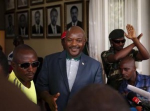 Burundi"s President Pierre Nkurunziza (C) walks after a news a news conference in Bujumburi, Burundi
