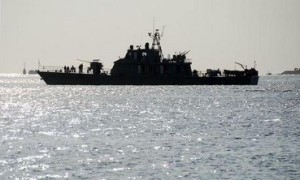 One of two Iranian navy warships arrives to dock at Port Sudan in the Red Sea state