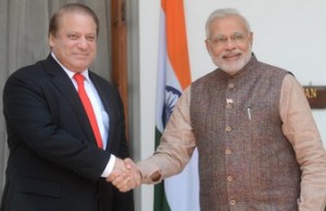 India's newly sworn-in Prime Minister Narendra Modi (R) shakes hands with Pakistani Prime Minister Nawaz Sharif during a meeting in New Delhi