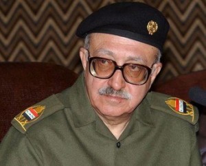 Iraqi Deputy Prime Minister Tariq Aziz speaks to an Egyptian delegation in Baghdad