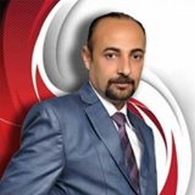 الكاتب الصحفى محمد العزبى