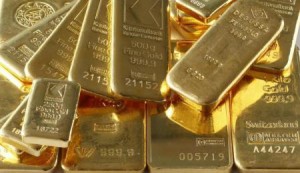 الذهب يتراجع مع صعود الدولار وإخفاق تصويت اليونانيين في تحفيز طلب قوي
