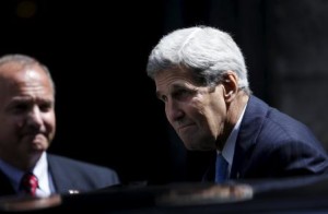 U.S. Secretary of State John Kerry leaves Stephen"s Cathedral after attending a mass in Vienna