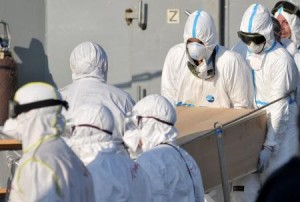 A coffin, containing the body of an unidentified migrant, is carried off the Irish Navy vessel Le Niamh in the Sicilian harbour of Palermo, Italy 