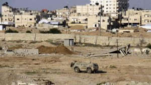 Egyptian army armored vehicle stands on the on the Egyptian side of border town of Rafah, north Sinai, Egypt