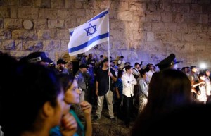 Israeli extreme far-right supporters demonstrate against Palestinians at one of the gates of the Jerusalem's Old City