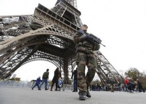 French military patrol near the Eiffel Tower the day after a series of deadly attacks in Paris