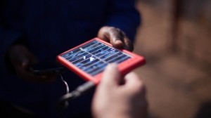 The solar charger uses USB technology to power up phones.