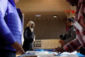 A woman arrives for her voting ballot during the U.S presidential election at the James Weldon Johnson Community Centre in the East Harlem neighbourhood of Manhattan, New York, US 