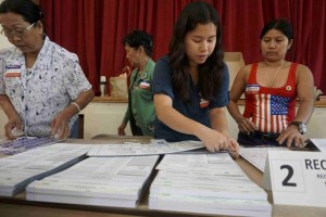 Poll workers distribute voting materials during the 2016 presidential election in San Diego, California, US 